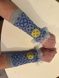 Fandom lace trimmed arm warmers. Priced per pair. Hand wash.