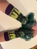 Fandom lace trimmed arm warmers. Priced per pair. Hand wash.